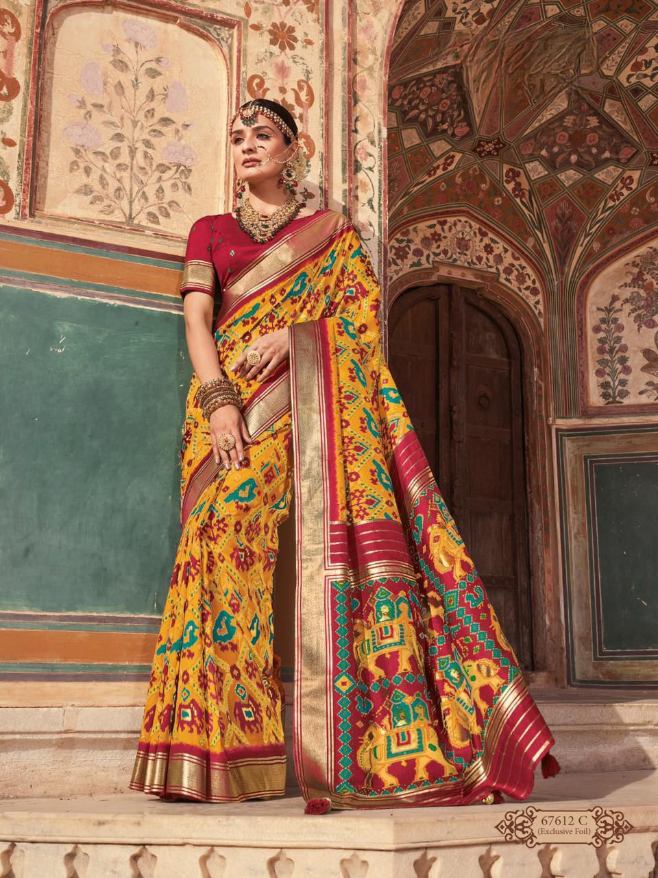 White And Red Patola Silk Saree